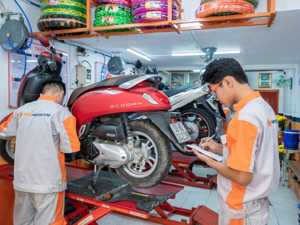 Mơ thấy đem xe máy đi tiệm sửa